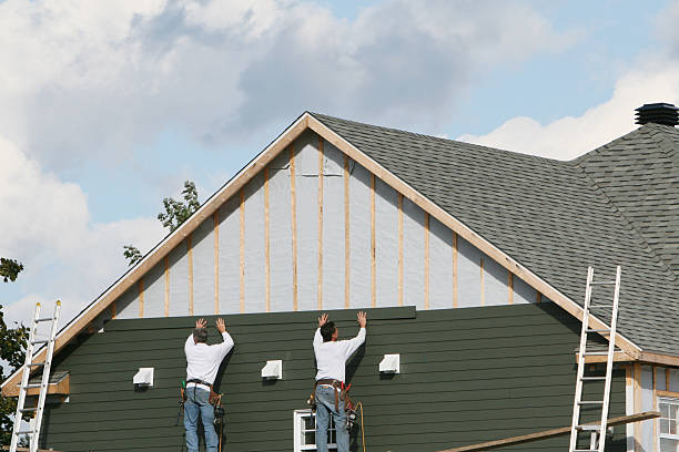 Professional Siding Contractor technician working in Montgomery Village, MD